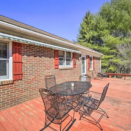 Quaint Creekside Home With Spacious Deck And Yard